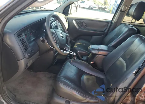 2003 Mazda Tribute Es z USA, uszkodzony, nr VIN 4F2CZ96143KM13474